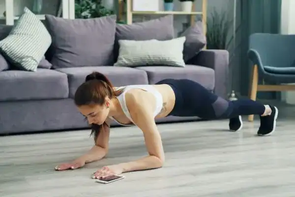 woman doing exercise to help build her pelvic floor health 